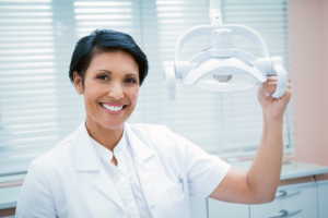 Dentist standing in dental office dentist reputation management