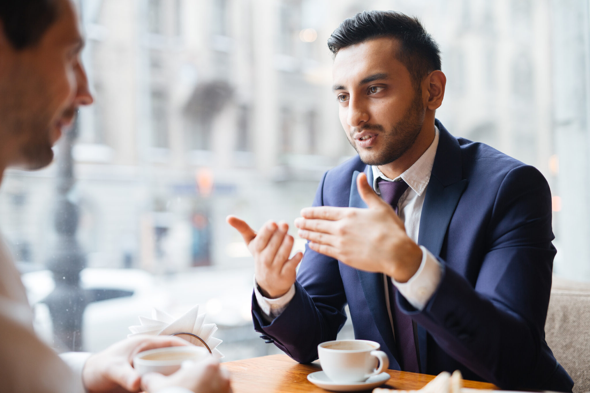 Insurance broker discussing plans with a client