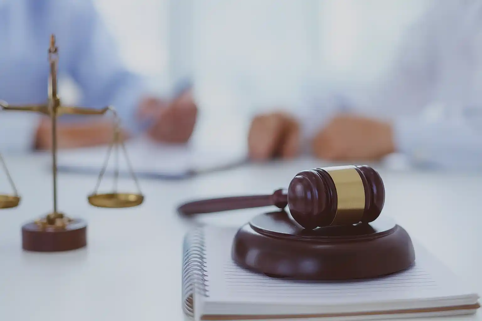 Gavel and legal documents on a desk representing Avvo law firm reviews.